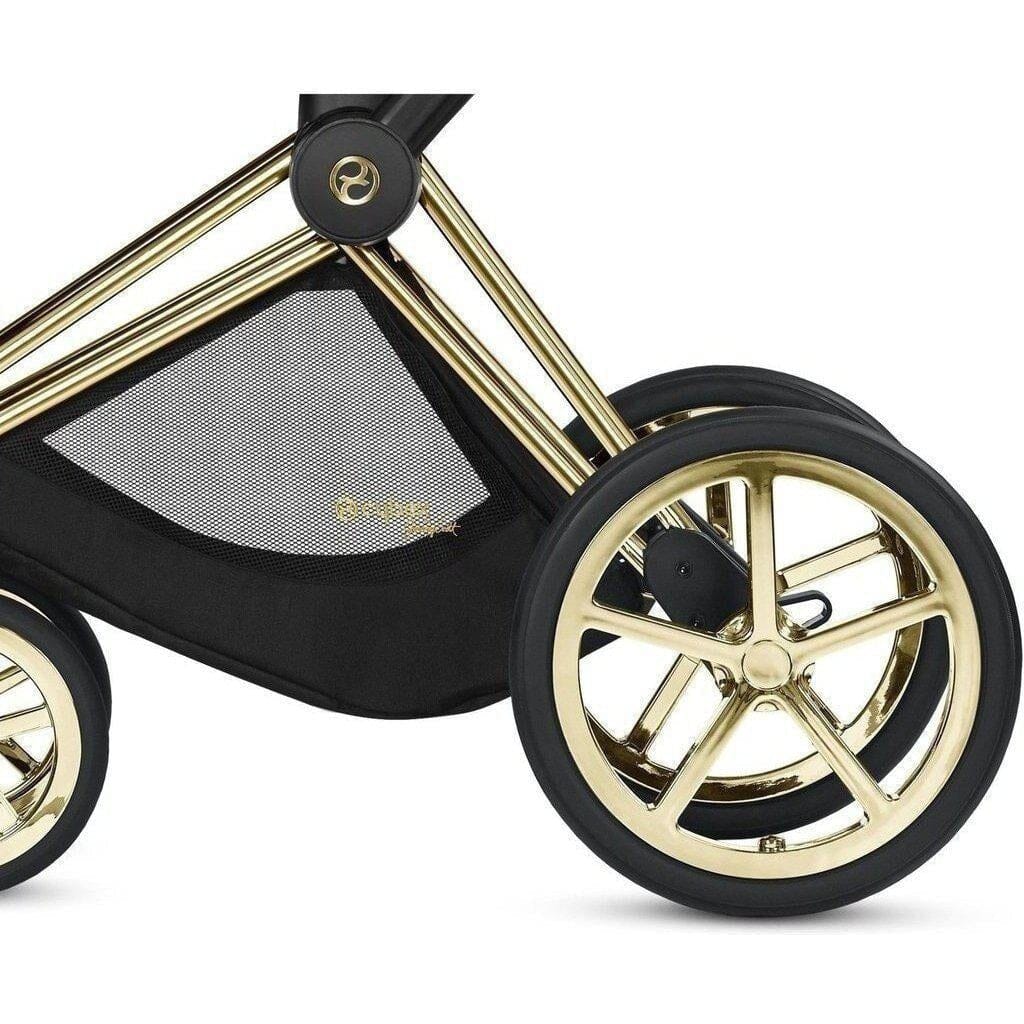 black and gold pram with wings