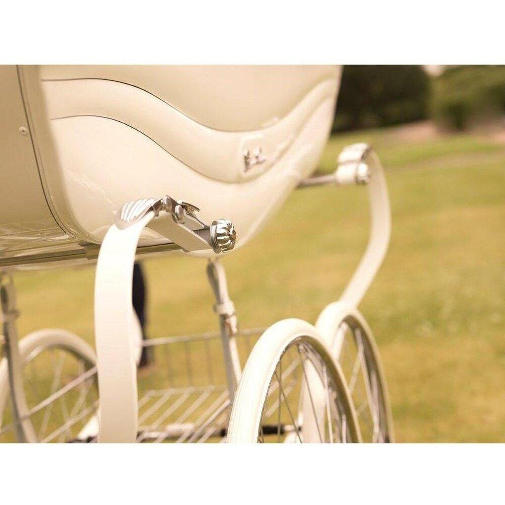 yellow silver cross pram