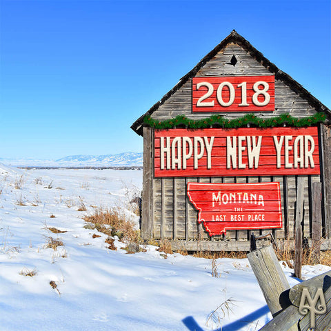 2018 Happy New Year, Montana signs hang on the side of a rustic Bozeman barn