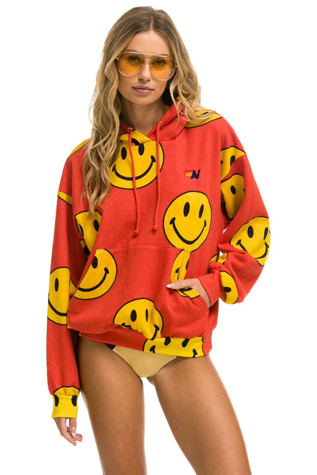 Image of SMILEY REPEAT RELAXED PULLOVER HOODIE - RED