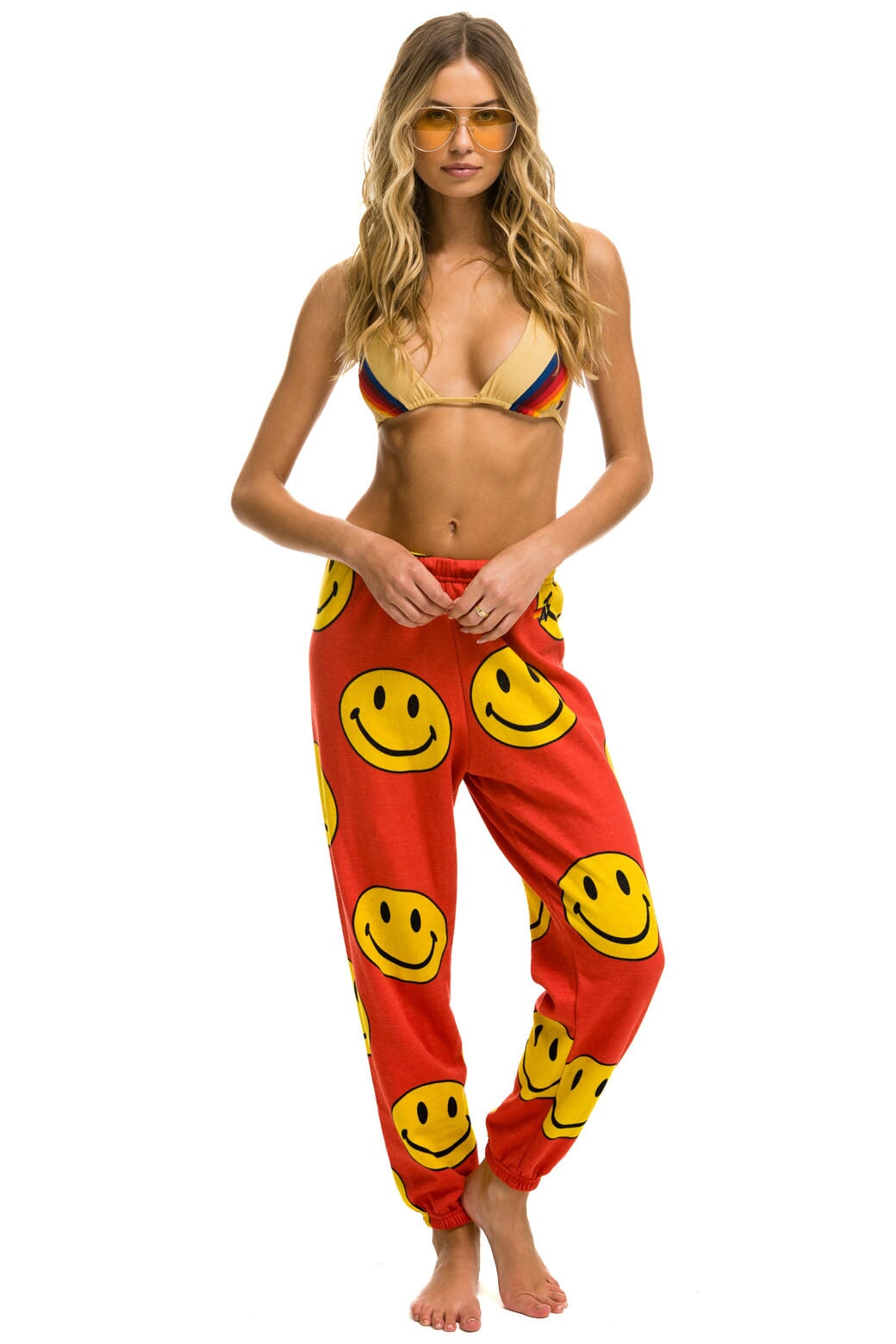 Image of SMILEY REPEAT SWEATPANTS - RED