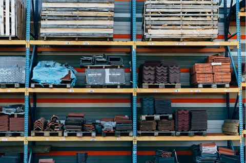 galvanised shelving units in a garage or industry storage unit holding industrial material