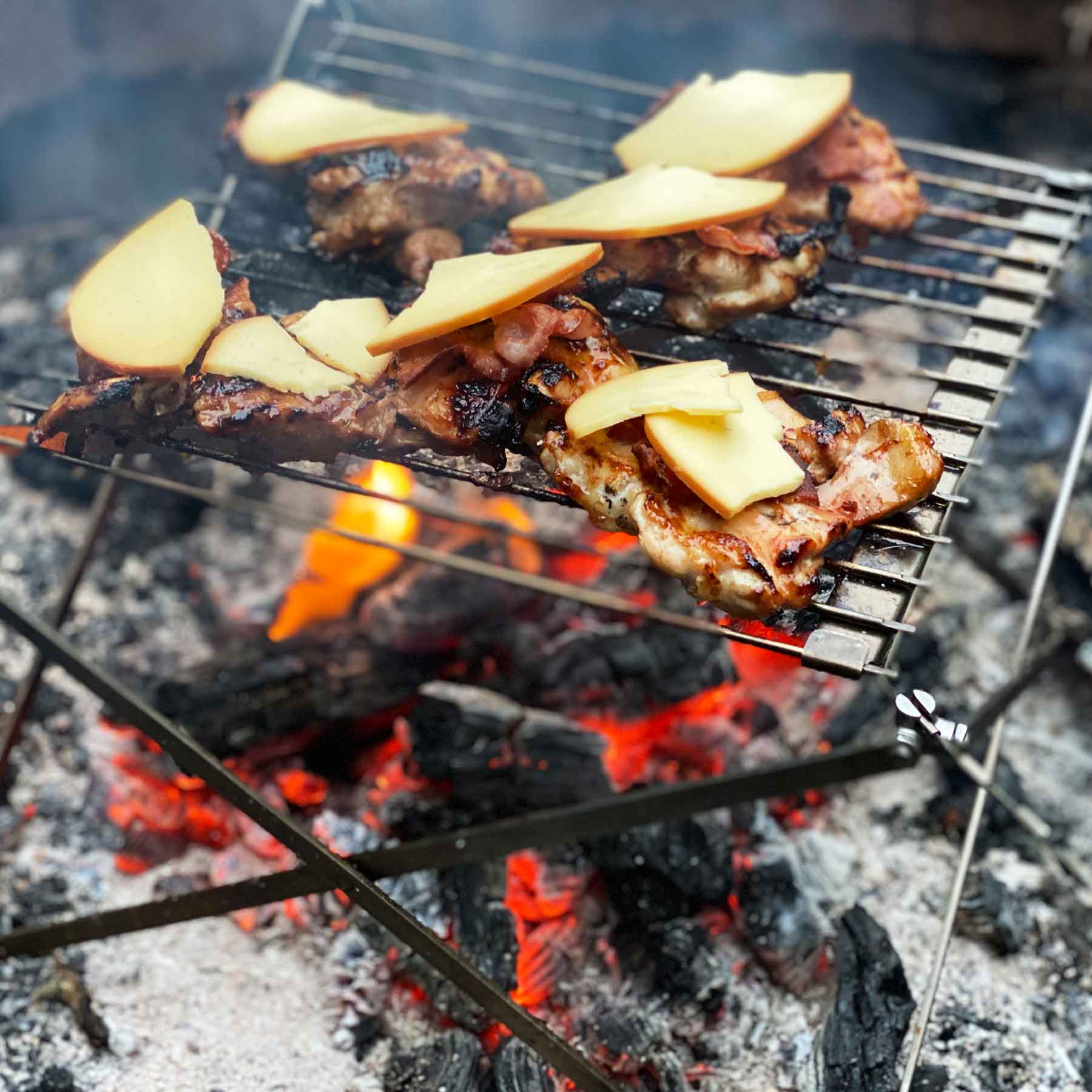 Cooking over the campfire after paragliding