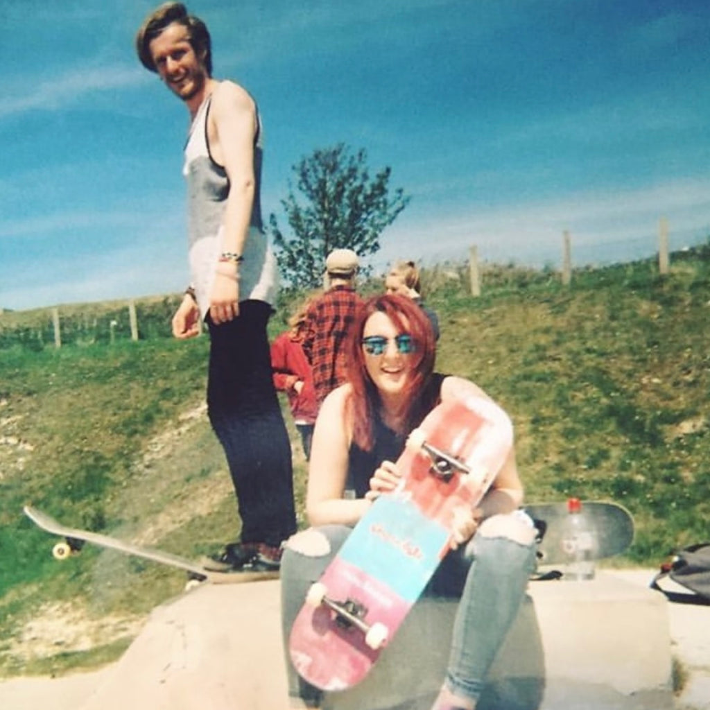 Two Clueless Backpackers skateboarding