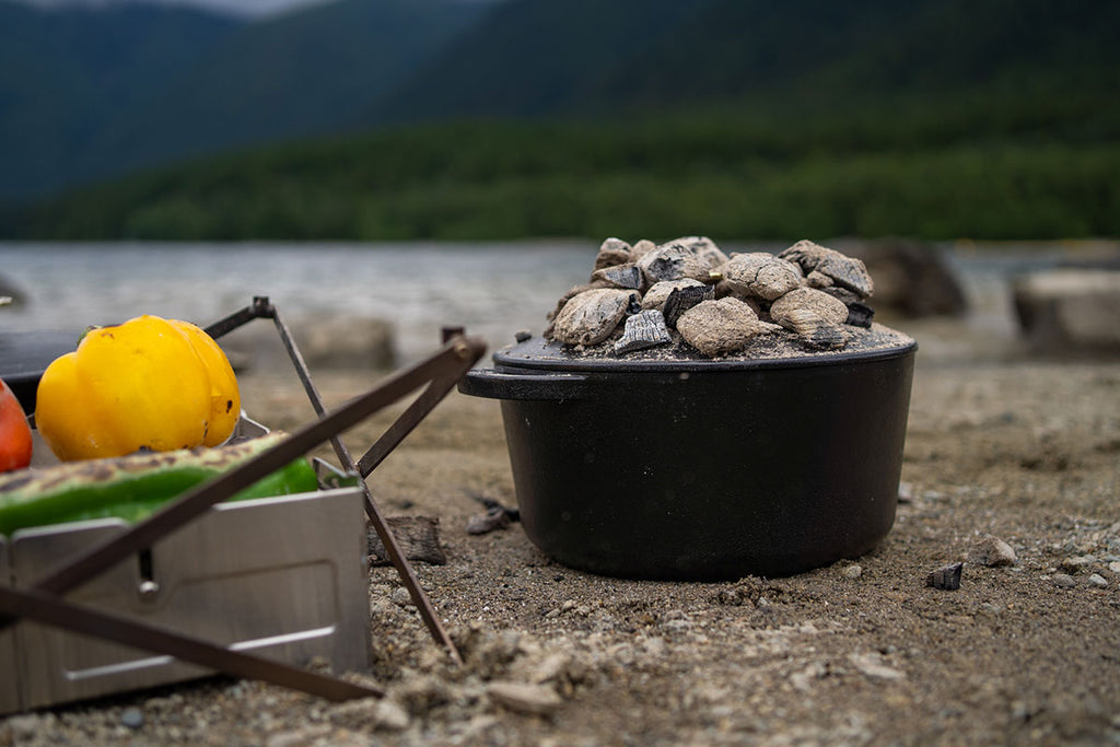 Cast-Iron Dutch Oven With Charcoals