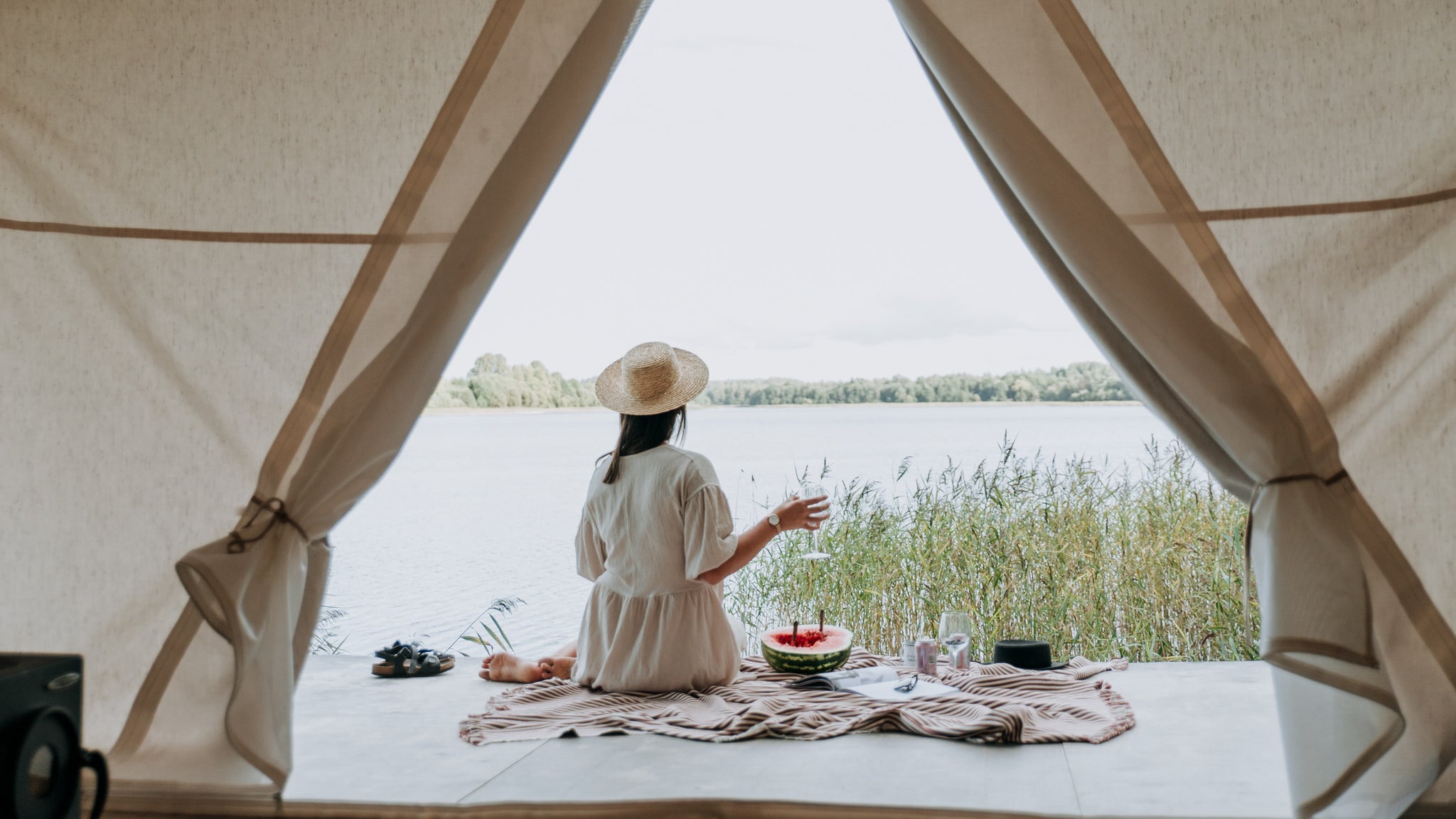 Fancy glamping tent by a lake 