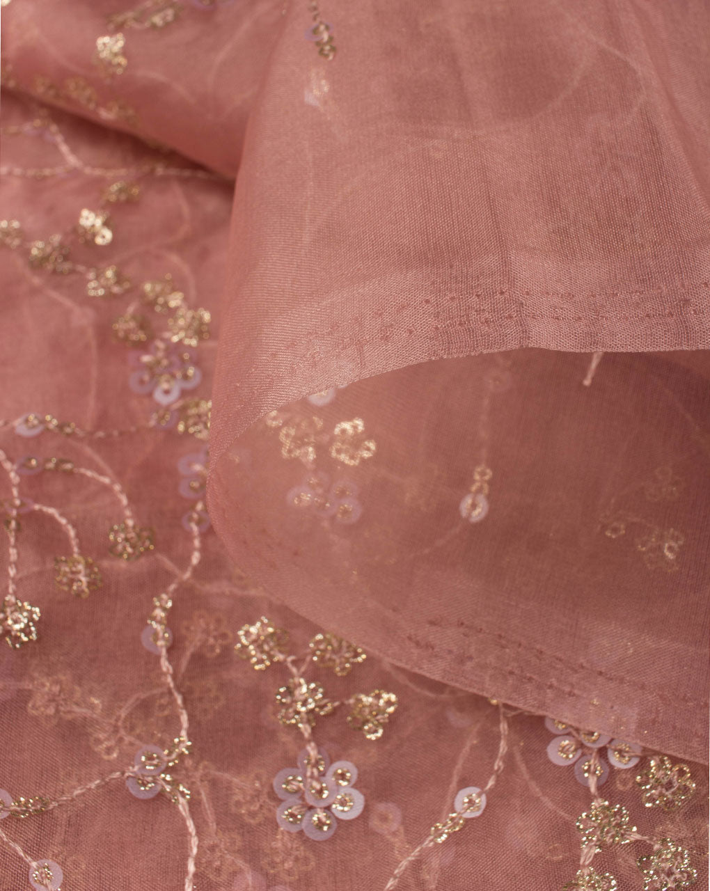 Use this embroidered fabric to embellish evening gowns