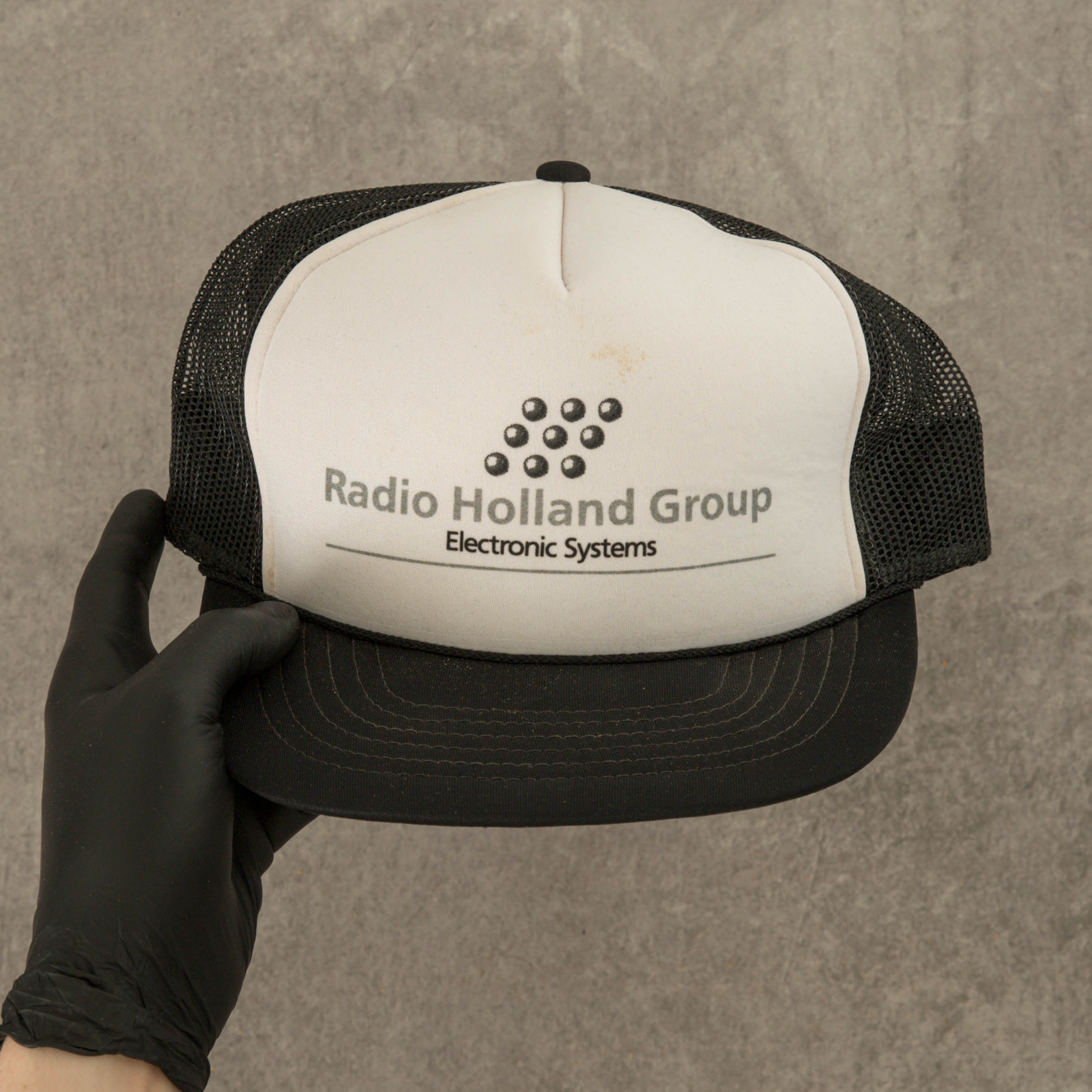 image of MEN'S VINTAGE 1990S RADIO HOLLAND GROUP TRUCKER CAP - M/L