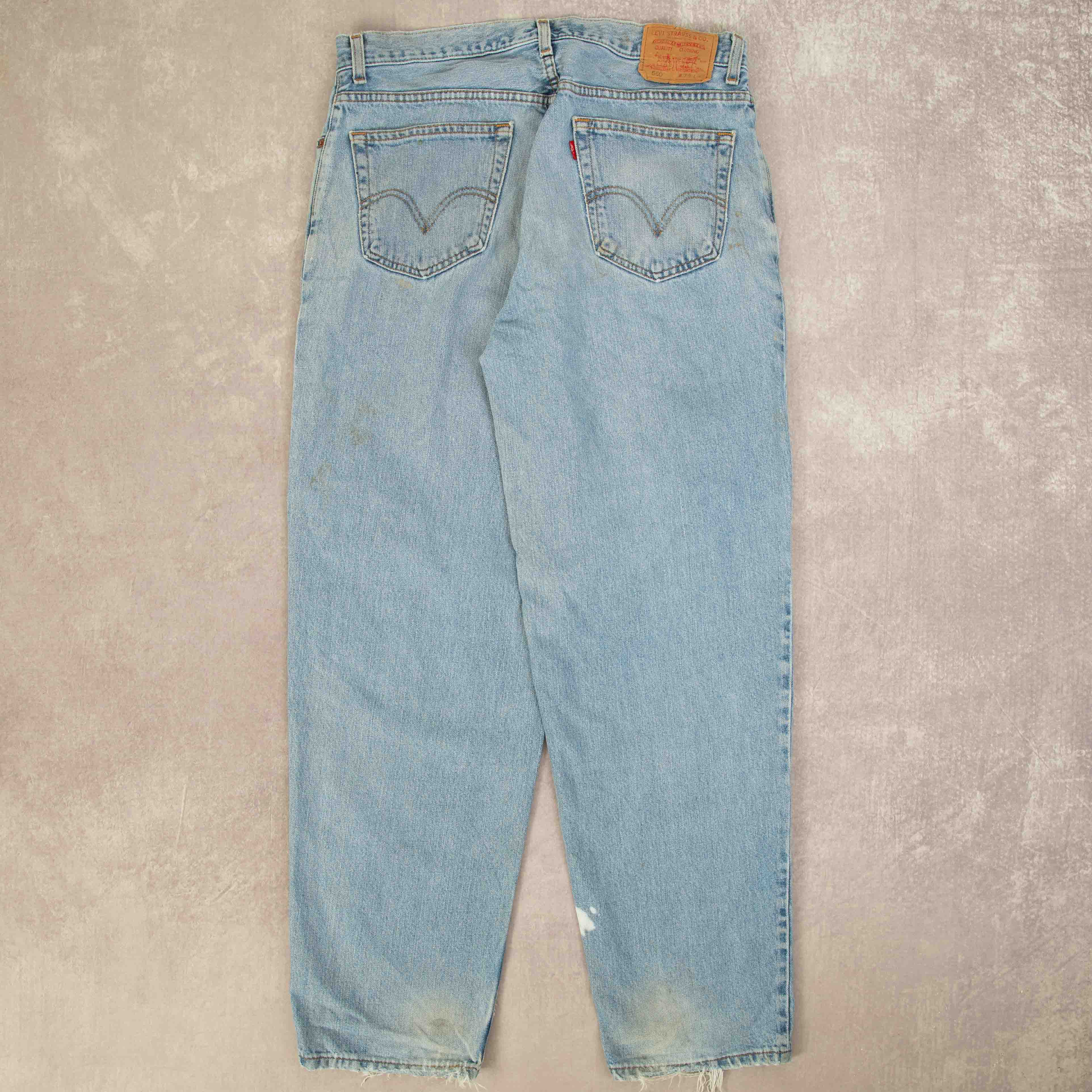 image of MEN'S VINTAGE LEVI'S 560 TAPERED FIT PAINTER JEANS - W32 X L32