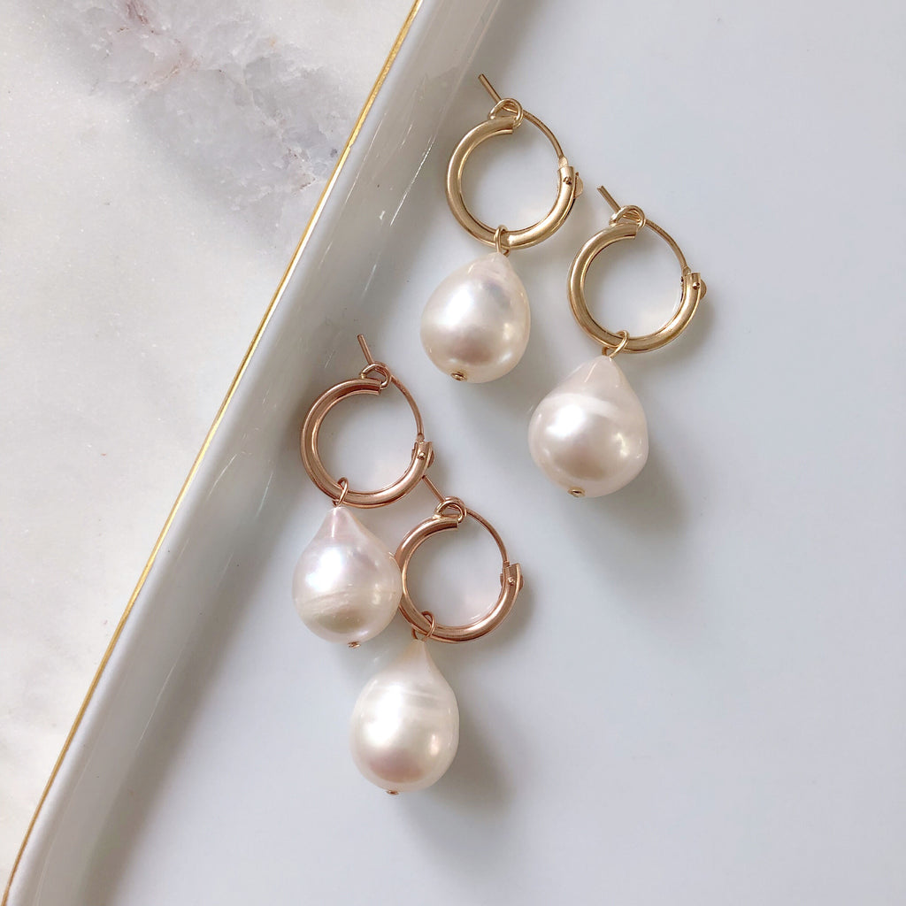 pearl earrings set in gold