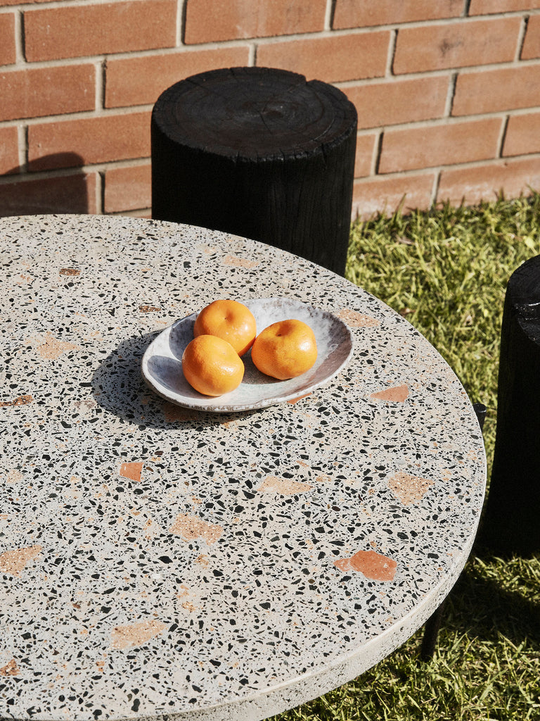 The Waste Terrazzo table and Telegraph stools. 