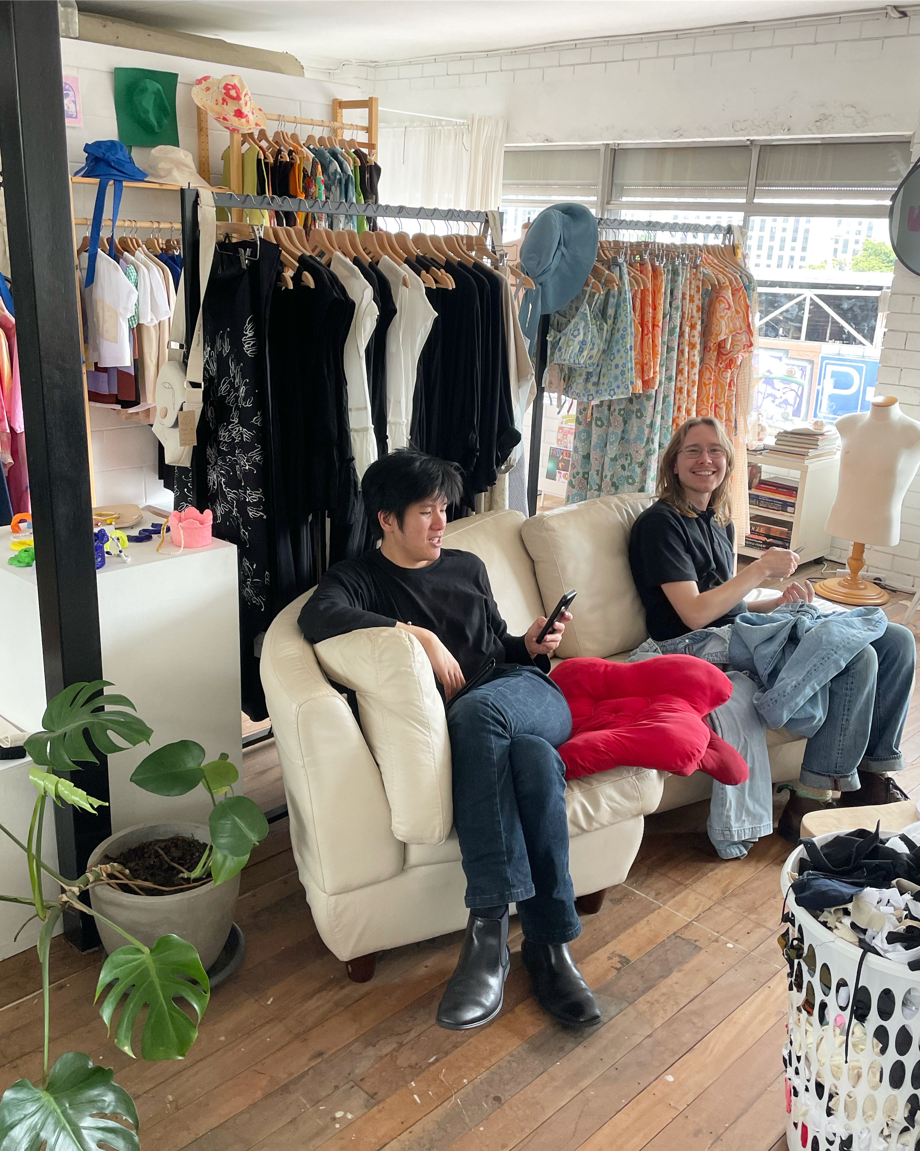 Designer Joash Teo (left) and sewest Thomas King (right) working in-store 