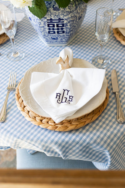 Grandmillennial table setting ideas- gingham table cloth, monogrammed napkins, ginger jar centerpiece