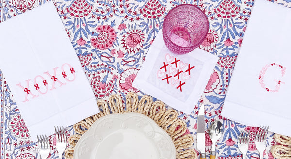 Pink, red with pops of blue block print tabletop for Valentine's Day brunch