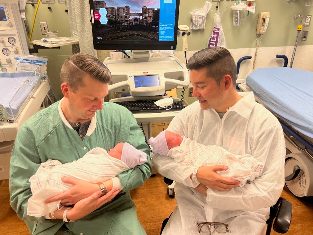 Bryan and Chris in the hospital shortly after their twins, Brecon and London, are born