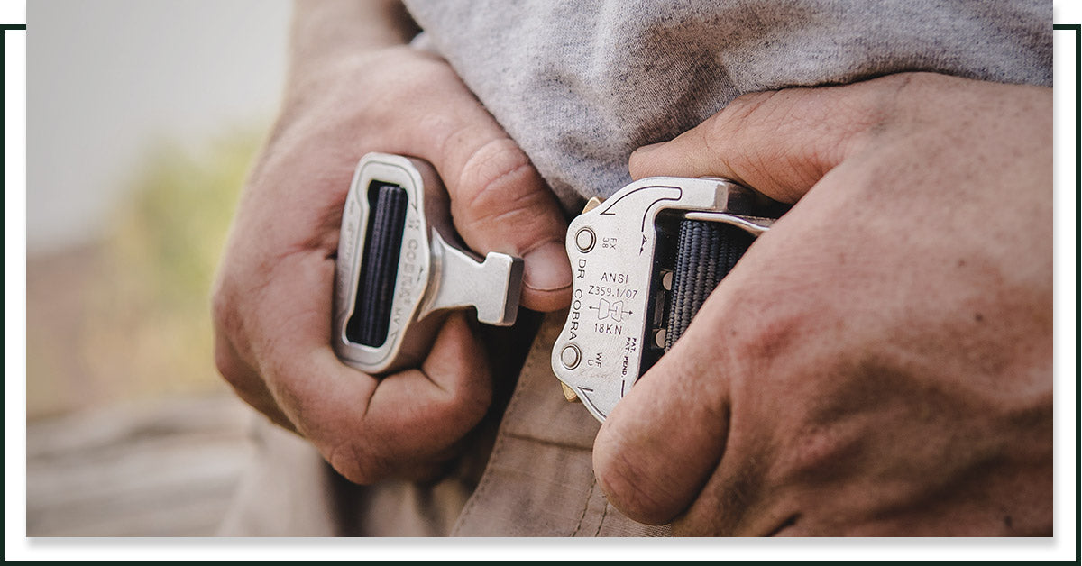 Image of a man putting on a belt from Klik Belts.