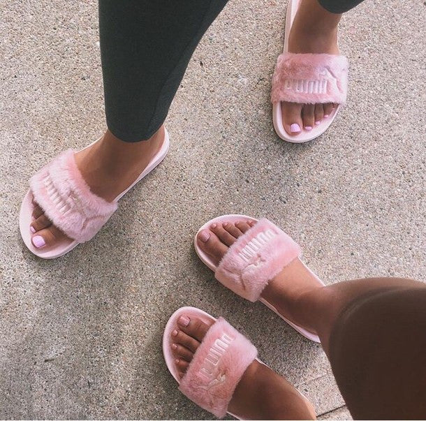 pink furry puma slides