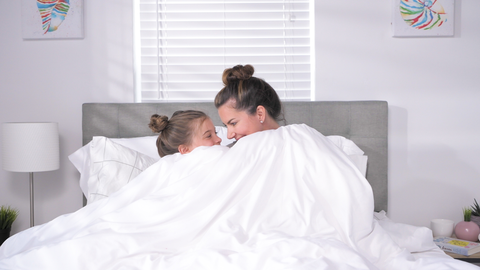 family-under-bed-covers