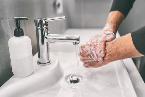 Person Washing Hands  