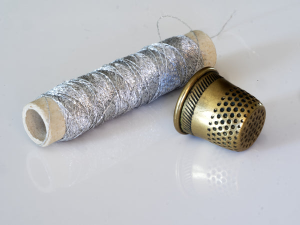 Silver Thread and Thimble