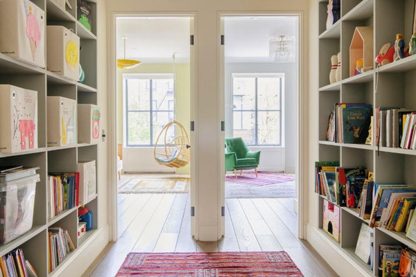 Jack and Jill kids’ rooms are fronted by a library/play space. The Canvas Storage Boxes on the shelves are from Kaikai & Ash.