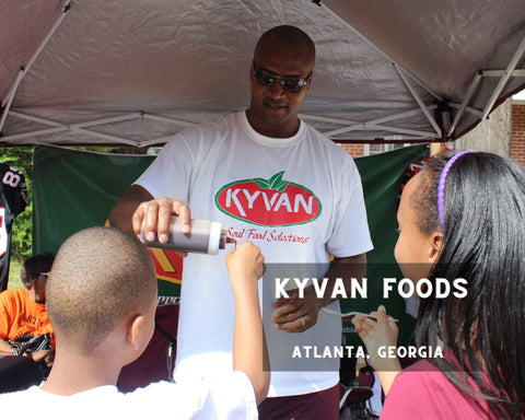 Kyvan Foods Owner Doing Sampling at a Farmers Market