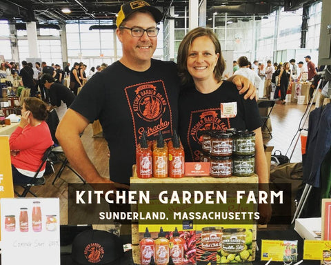 The Kitchen Garden Farms Team at a Farmers Market