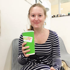 Small Business owner holding her free boost juice