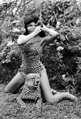 Bettie Page sewed her the leopard-print one-piece that she wore in this Bunny Yeager photograph.