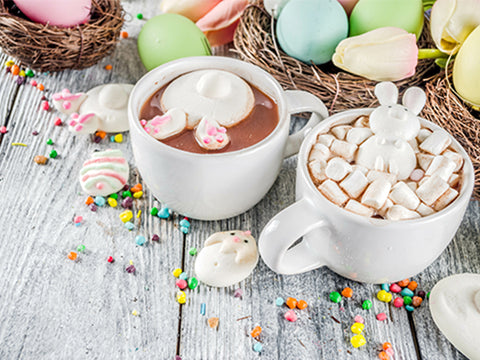 Mugs with hot chocolate and bunny marshmallows