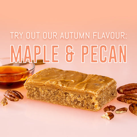 Try out our Autumn flavours: Maple and Pecan. Bar of Maple and Pecan Fudge surrounded by pecan nuts and a glass bowl of Canadian maple syrup 