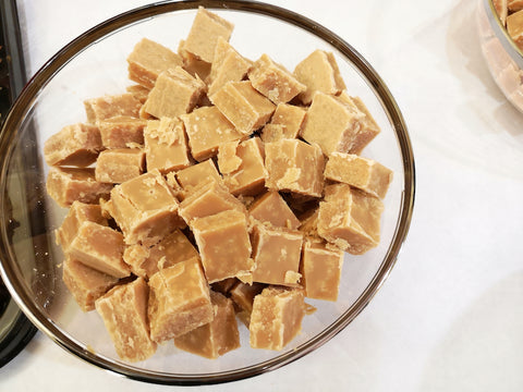 Clear Bowl with Gold Rim and Pieces of Scottish Tablet.