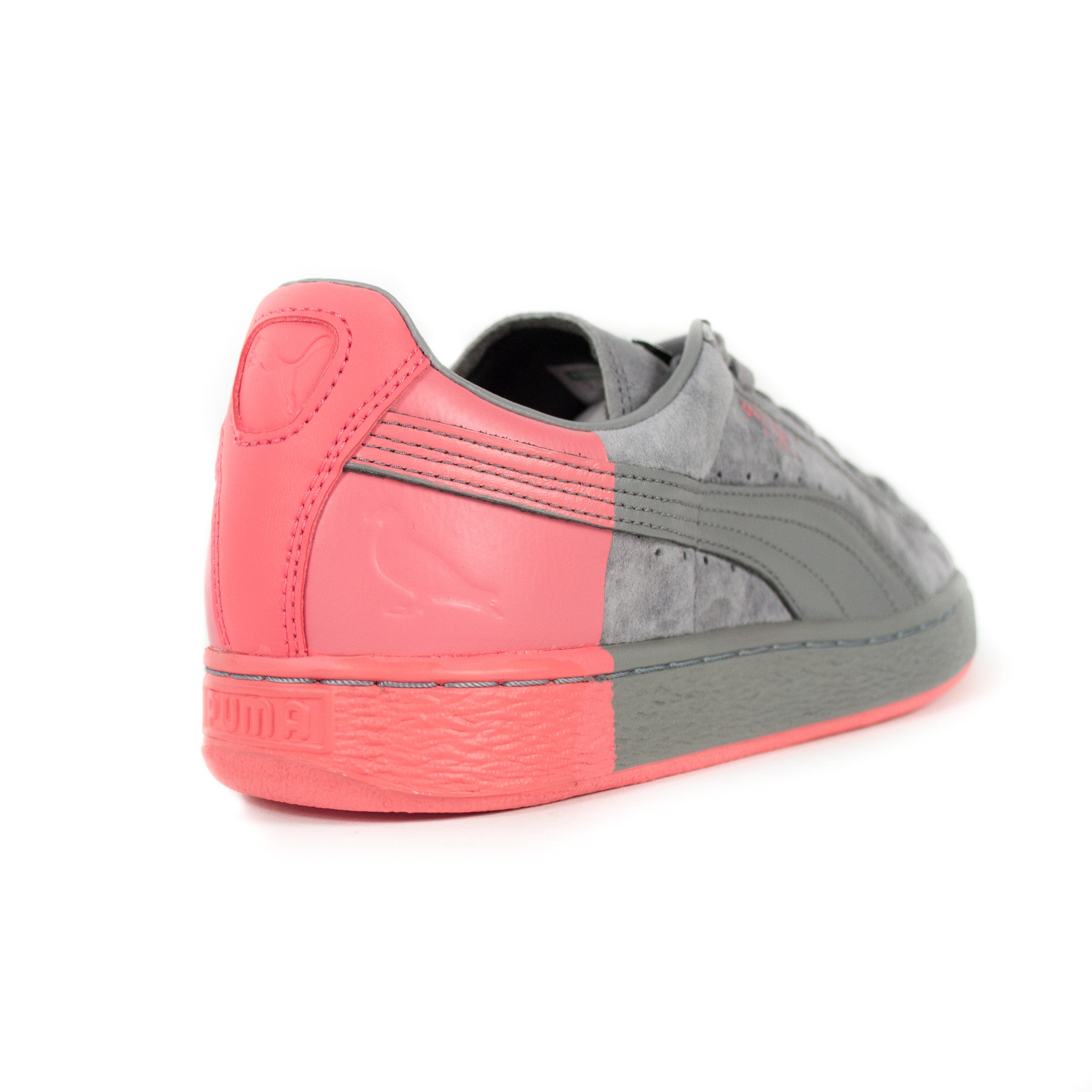 grey and red puma suede