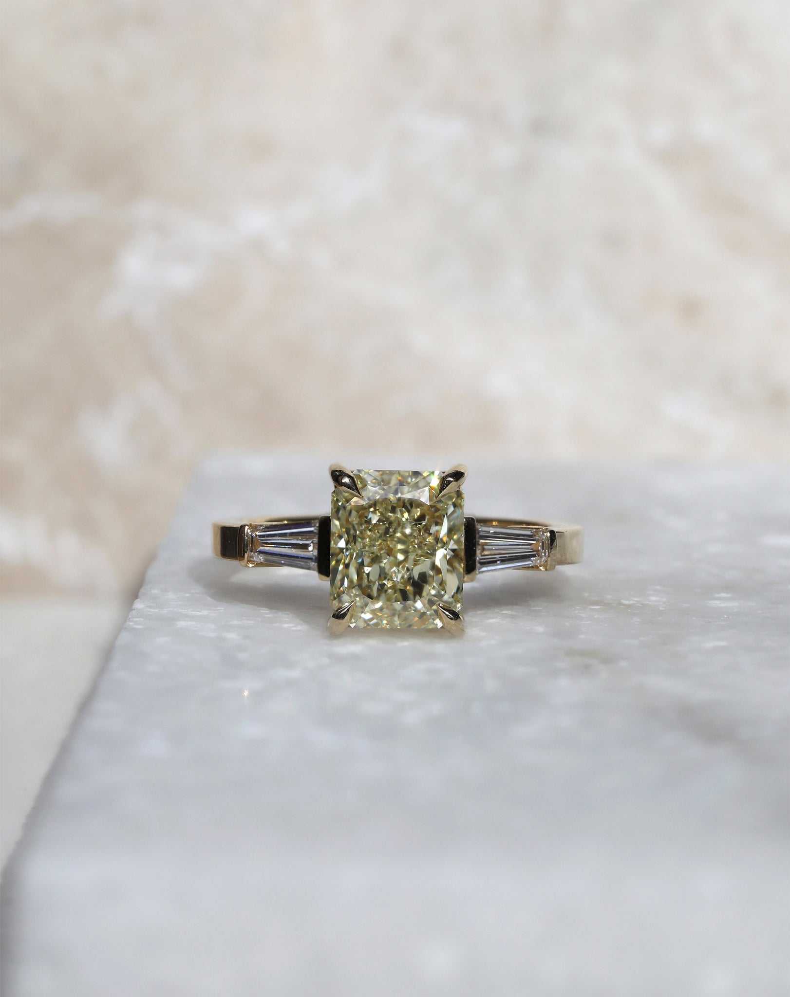 Radiant cut yellow diamond engagement ring. Handcrafted in London by east London jeweller Rachel Boston