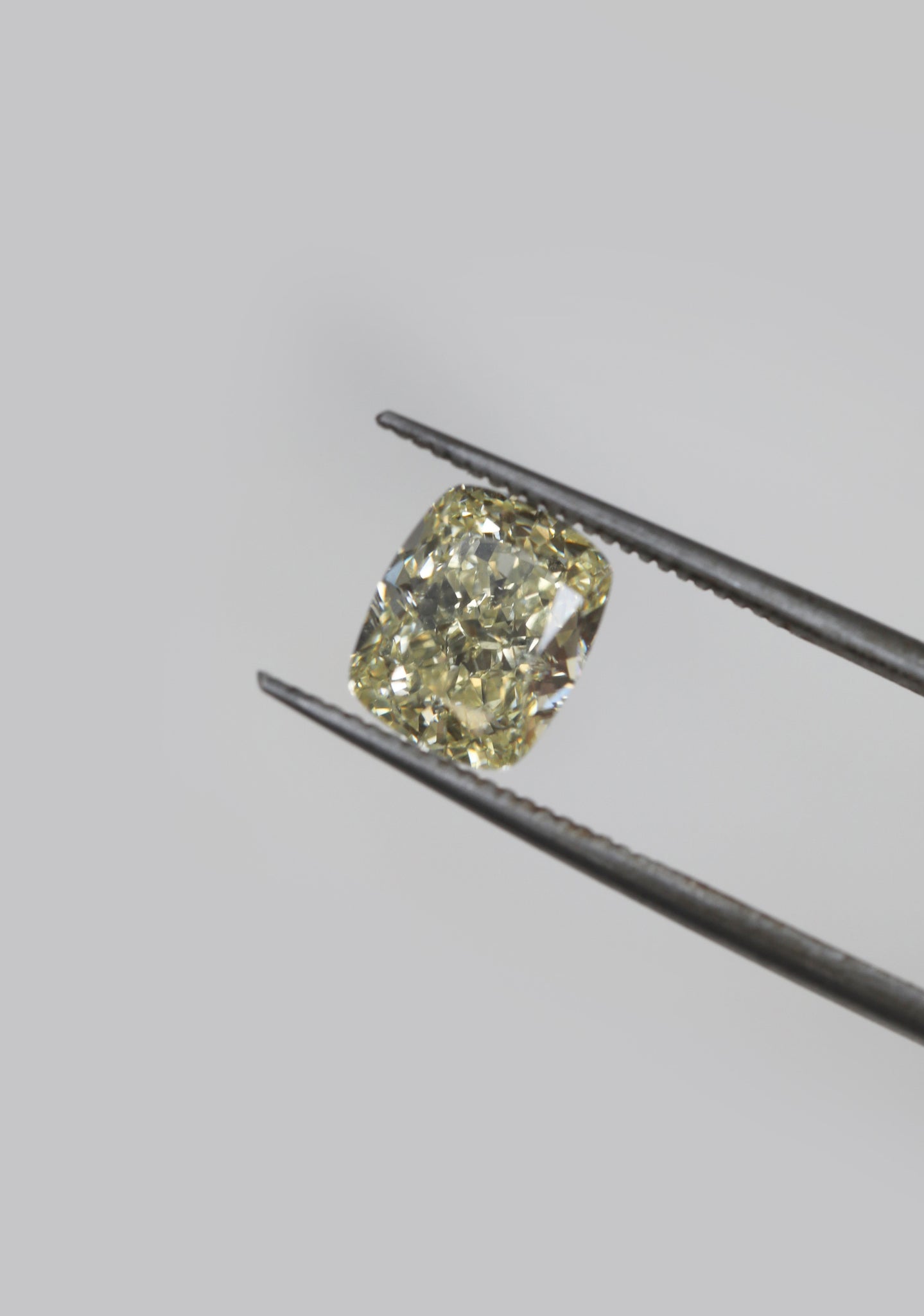 Cushion cut yellow diamond engagement ring. Handcrafted in London by east London jeweller Rachel Boston