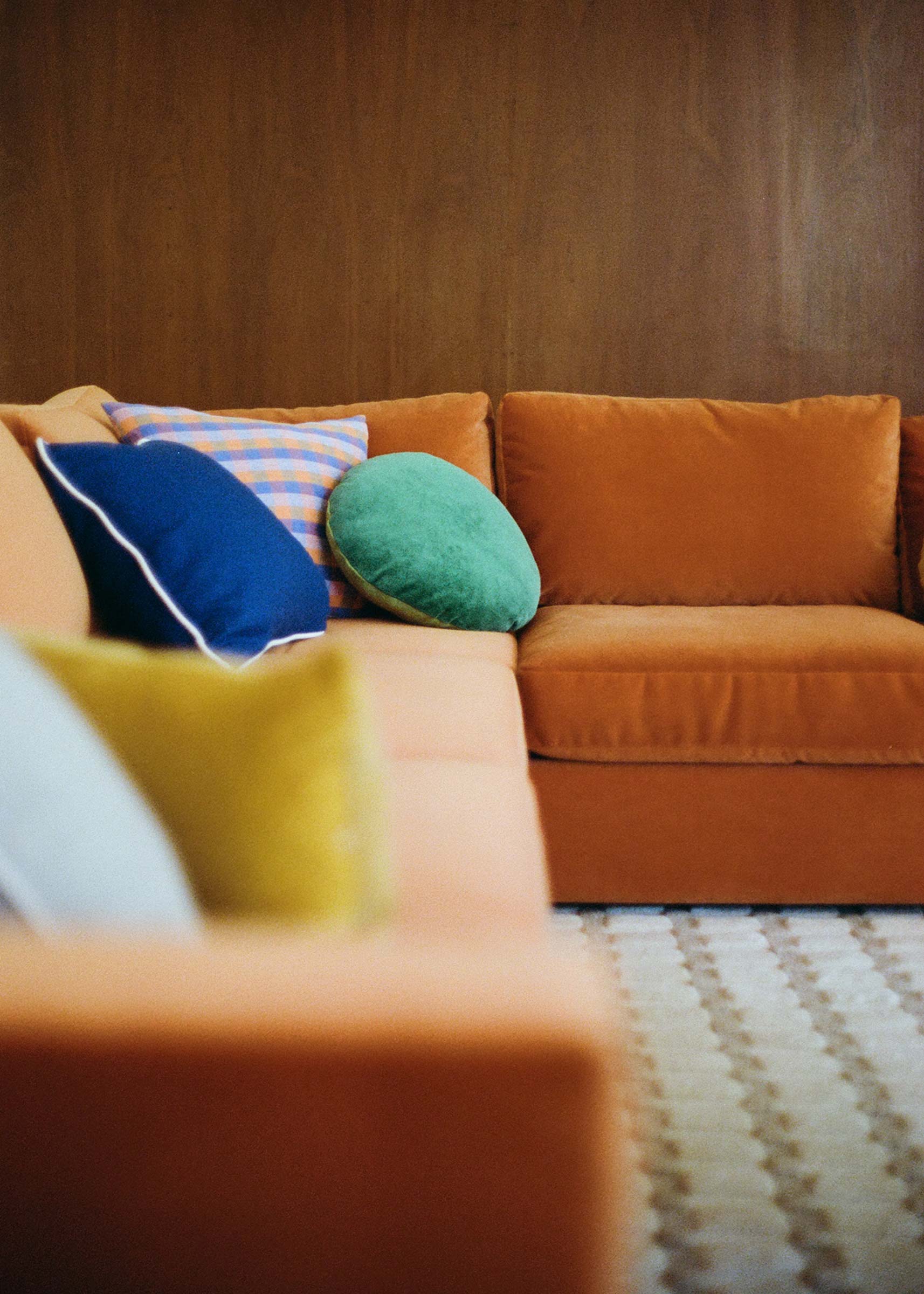 Colorful throw pillows on the Milo sofa.