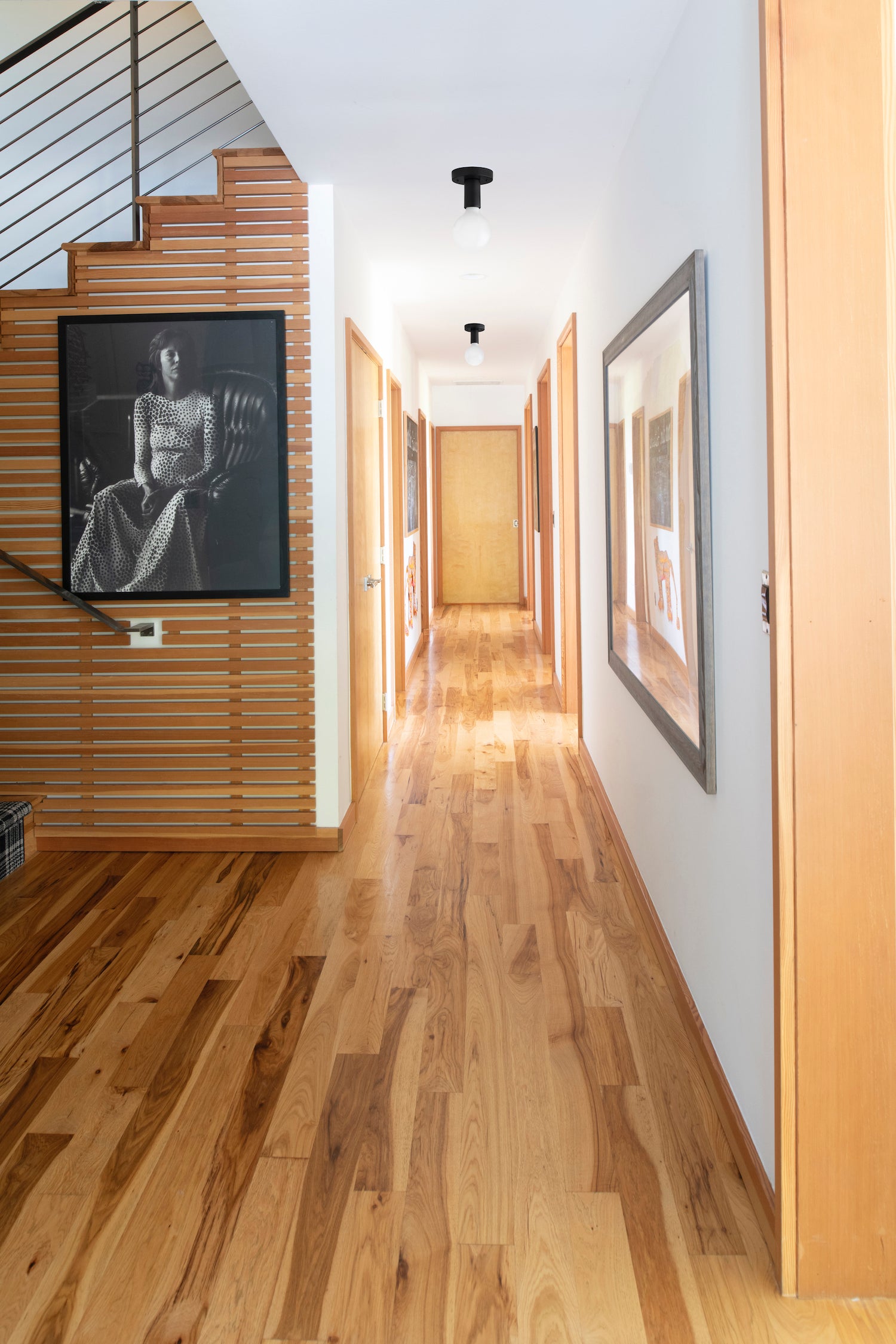 hallway with a painting on the wall