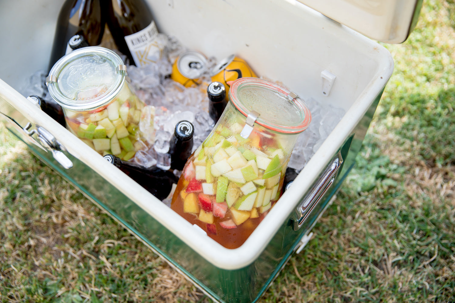 cooler with drinks and fruit and ice