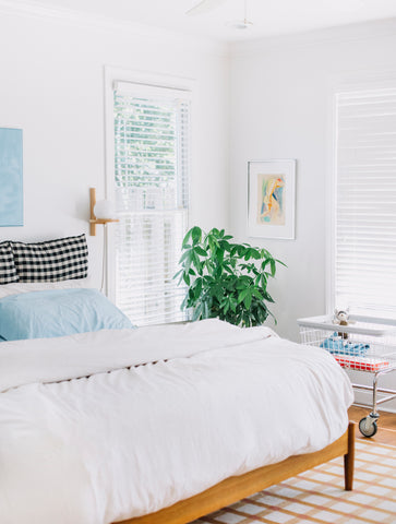 modern and colorful bedroom with white walls