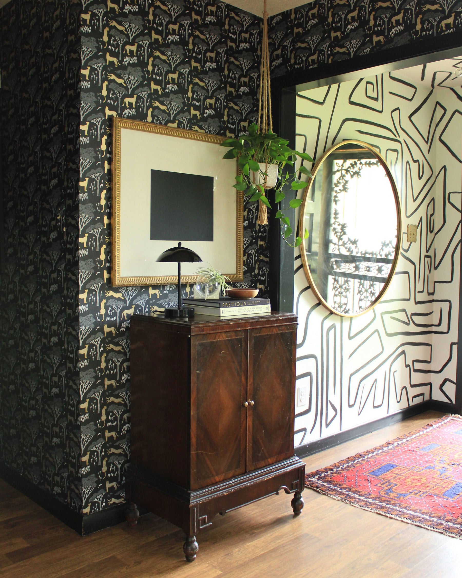 mirror on a wall with wallpaper
