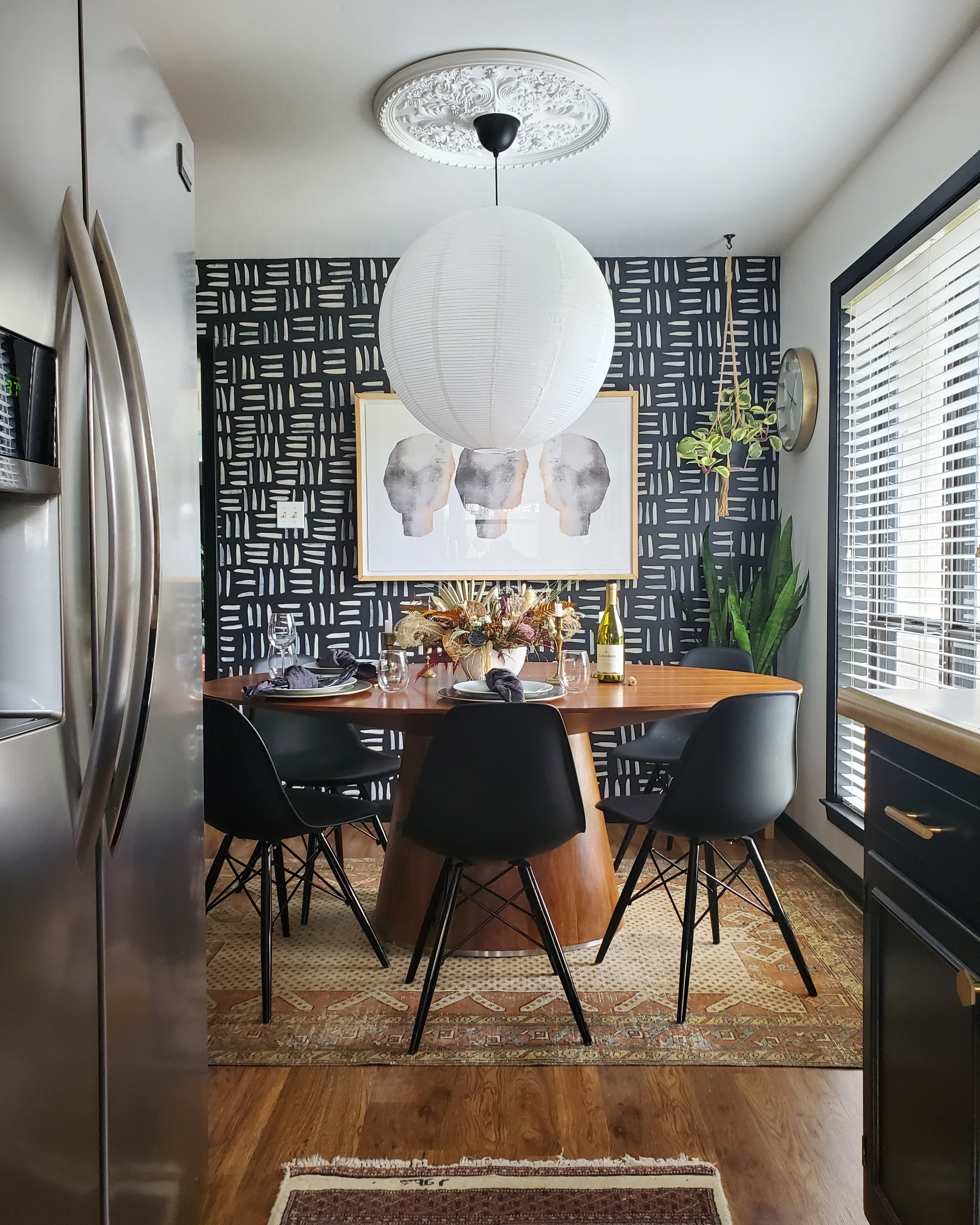 dining room with a table and black chairs