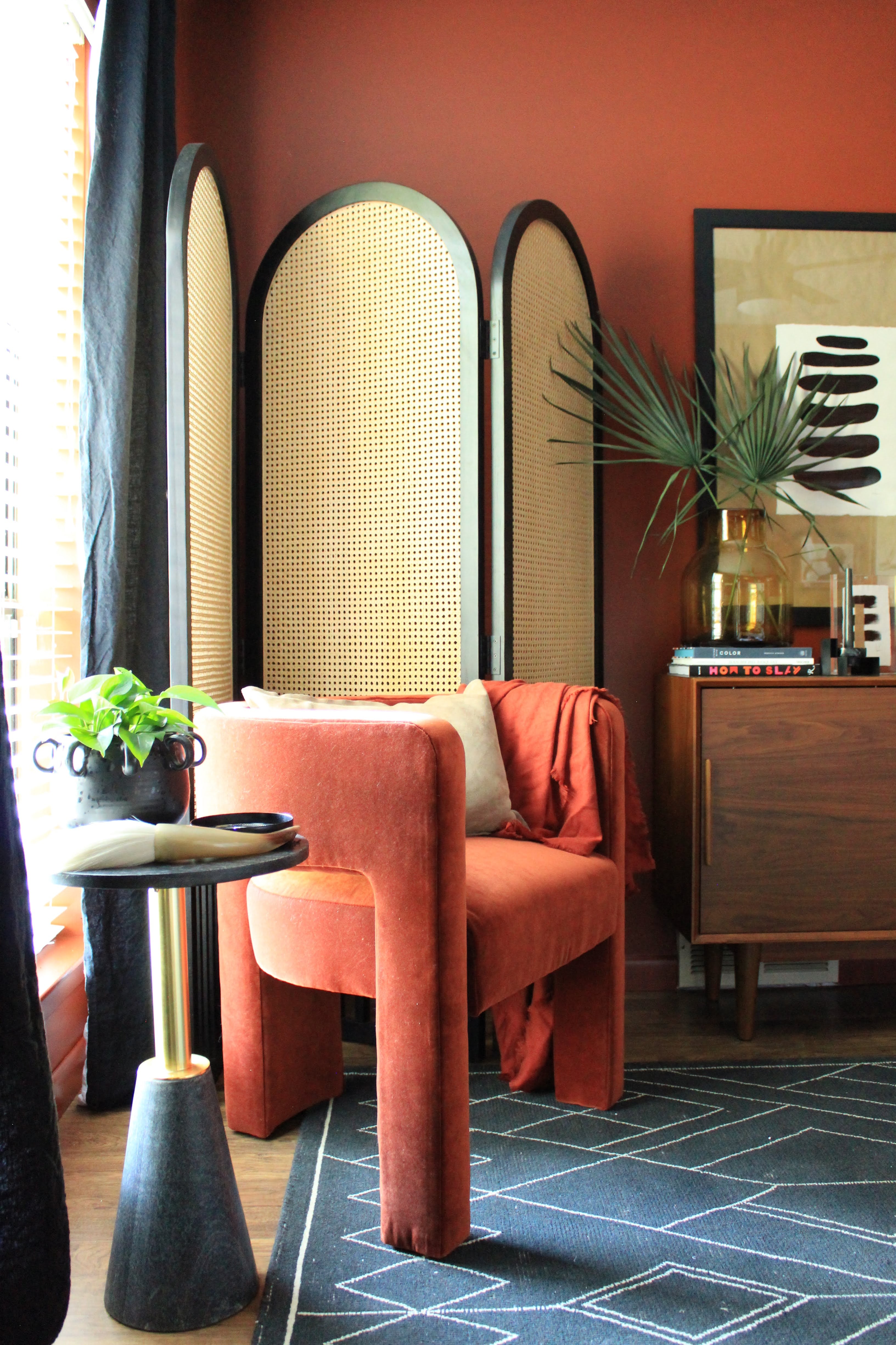 orange room with orange chair and divider