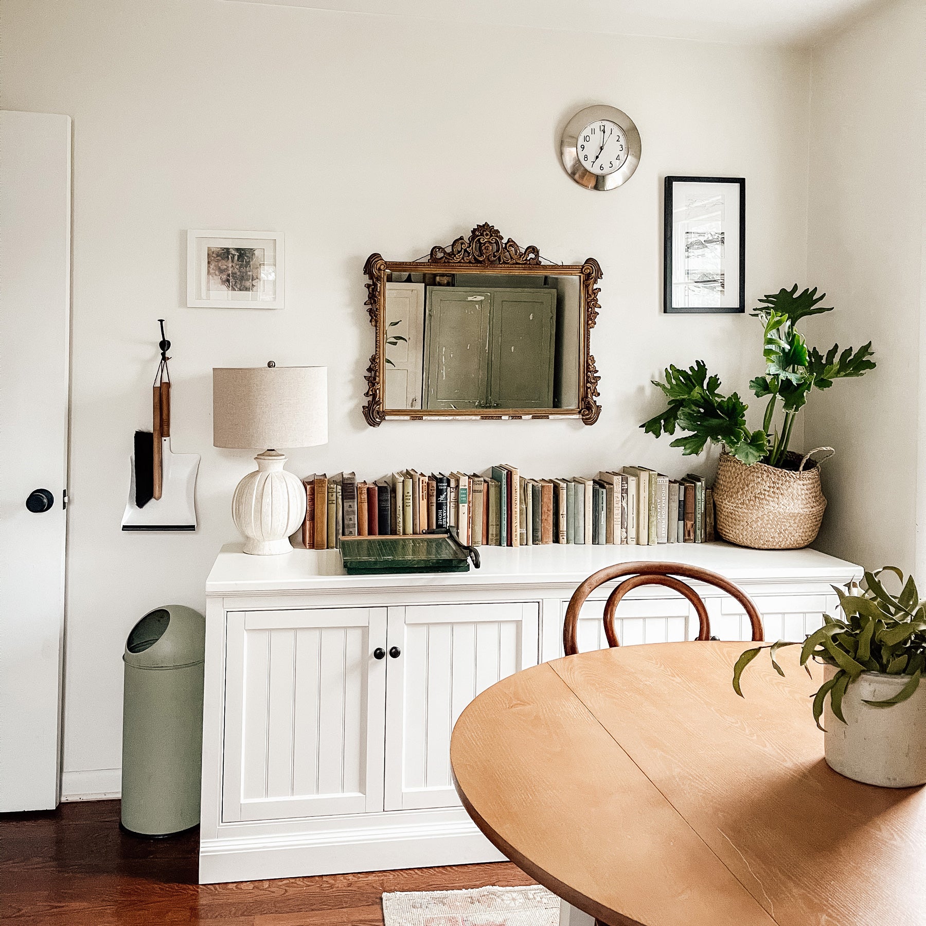 kitchen with a table and a mirror