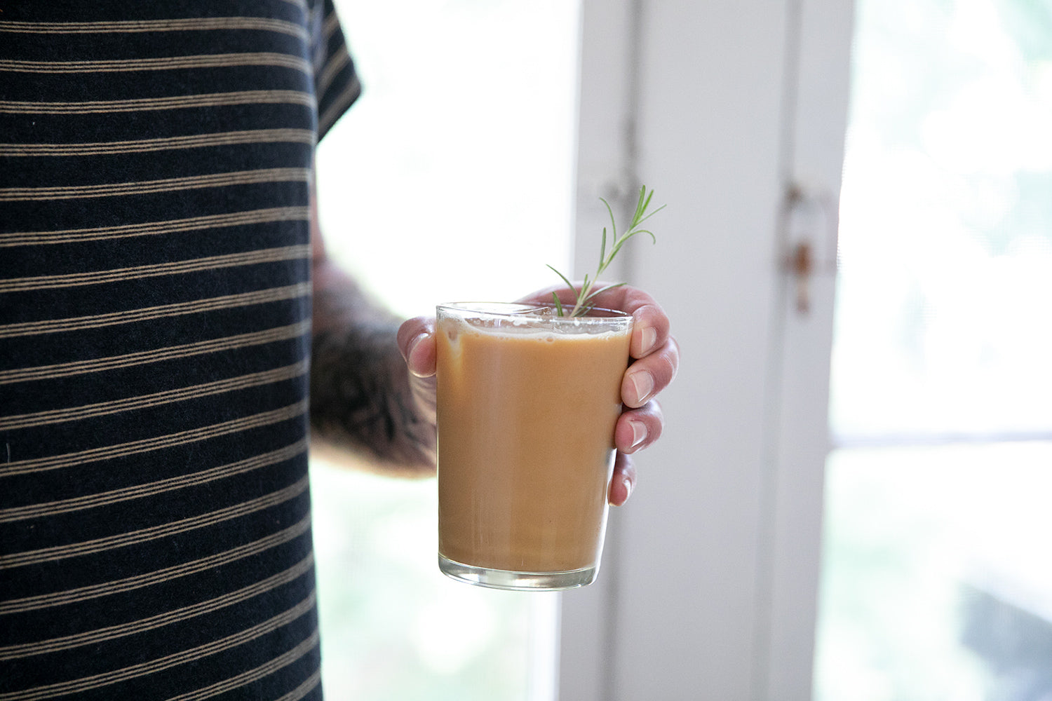 person holding a drink