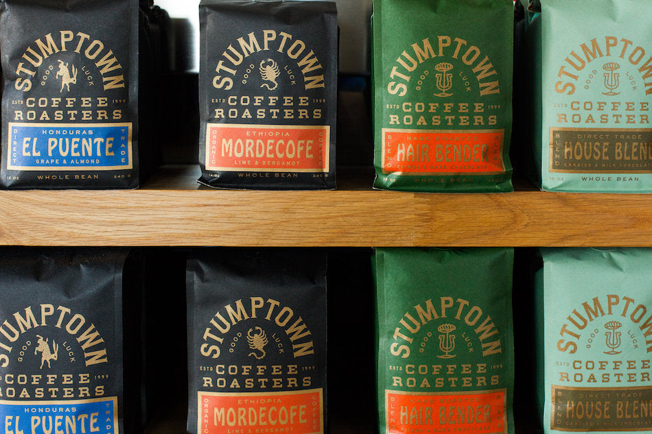 shelf of stumptown coffee beans