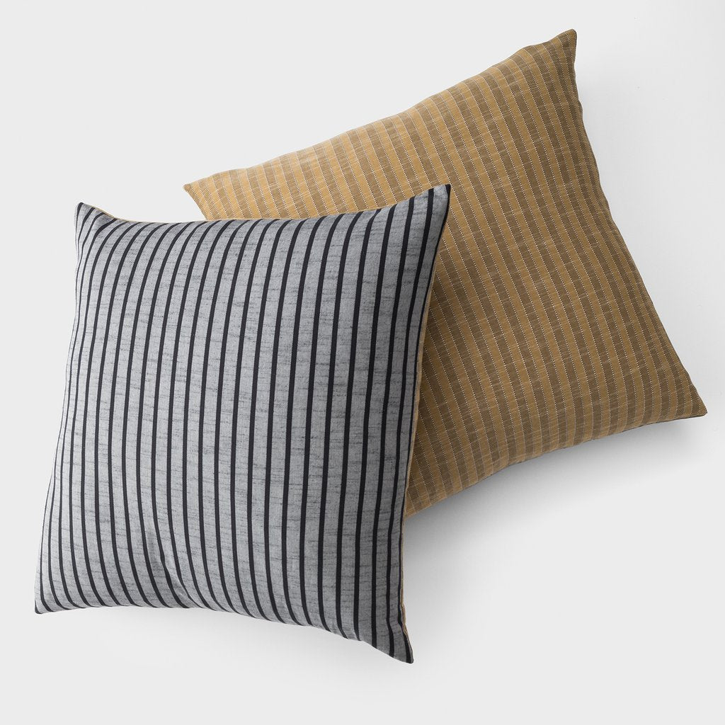 close-up of striped pillows