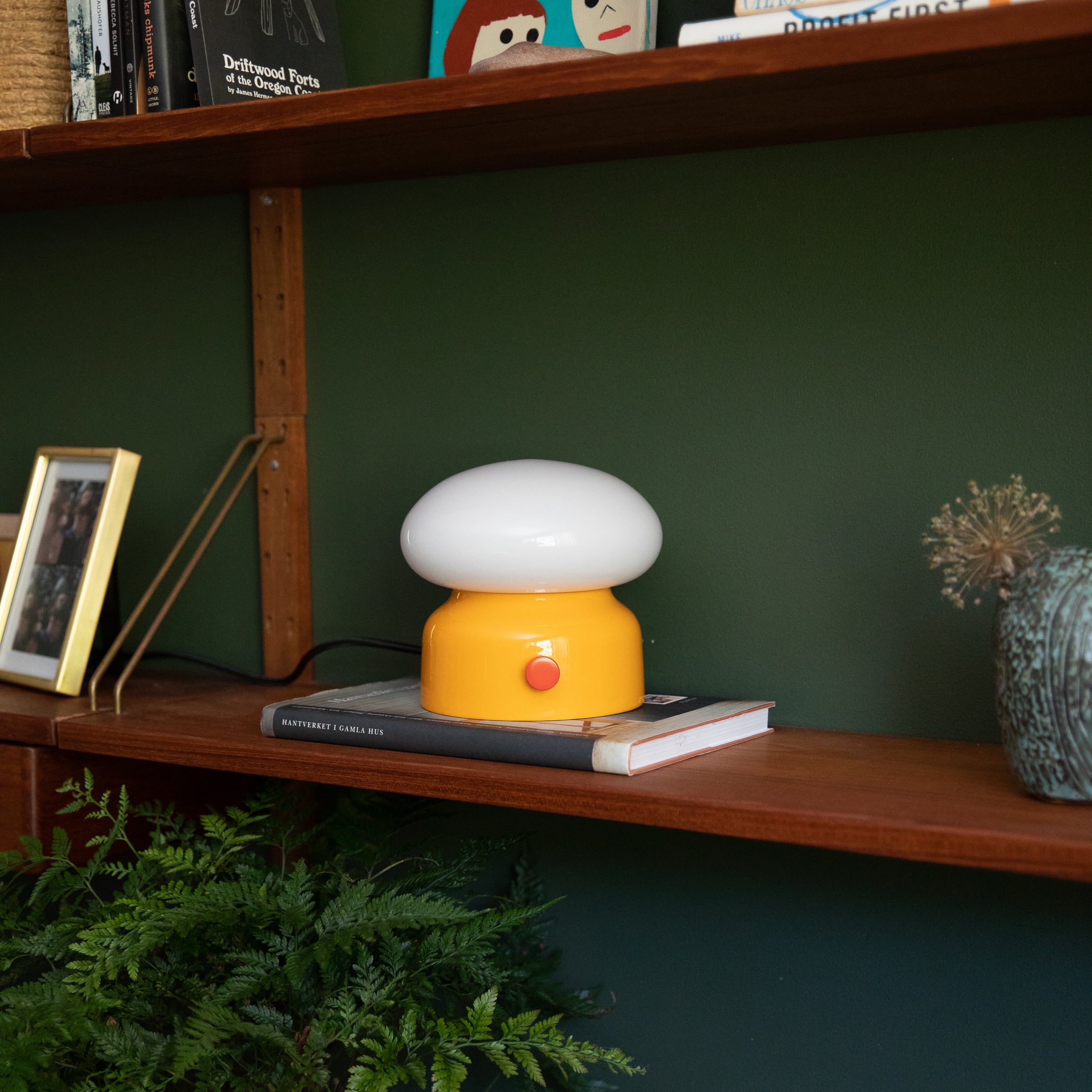 yellow lamp on a shelf