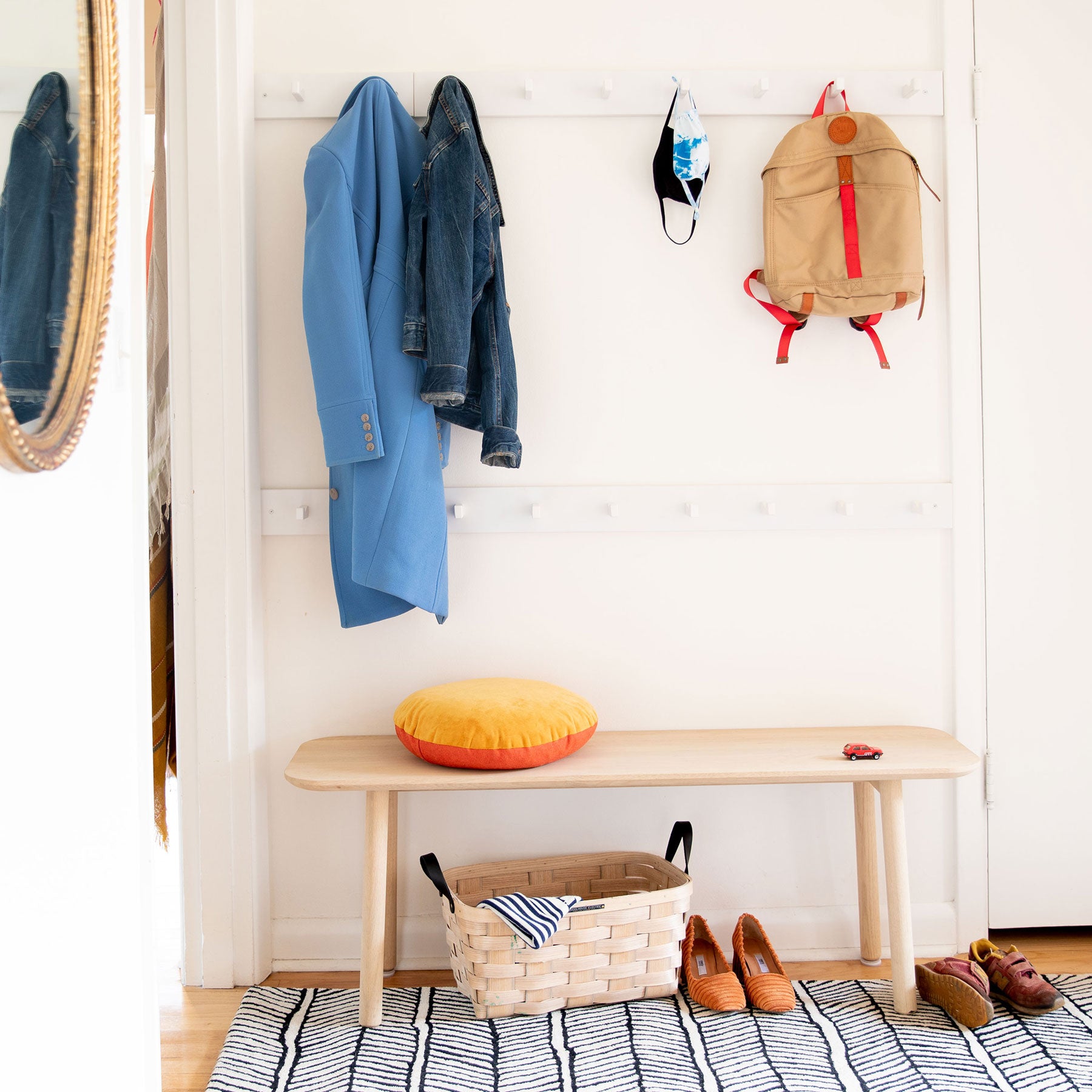 coat hooks and bench