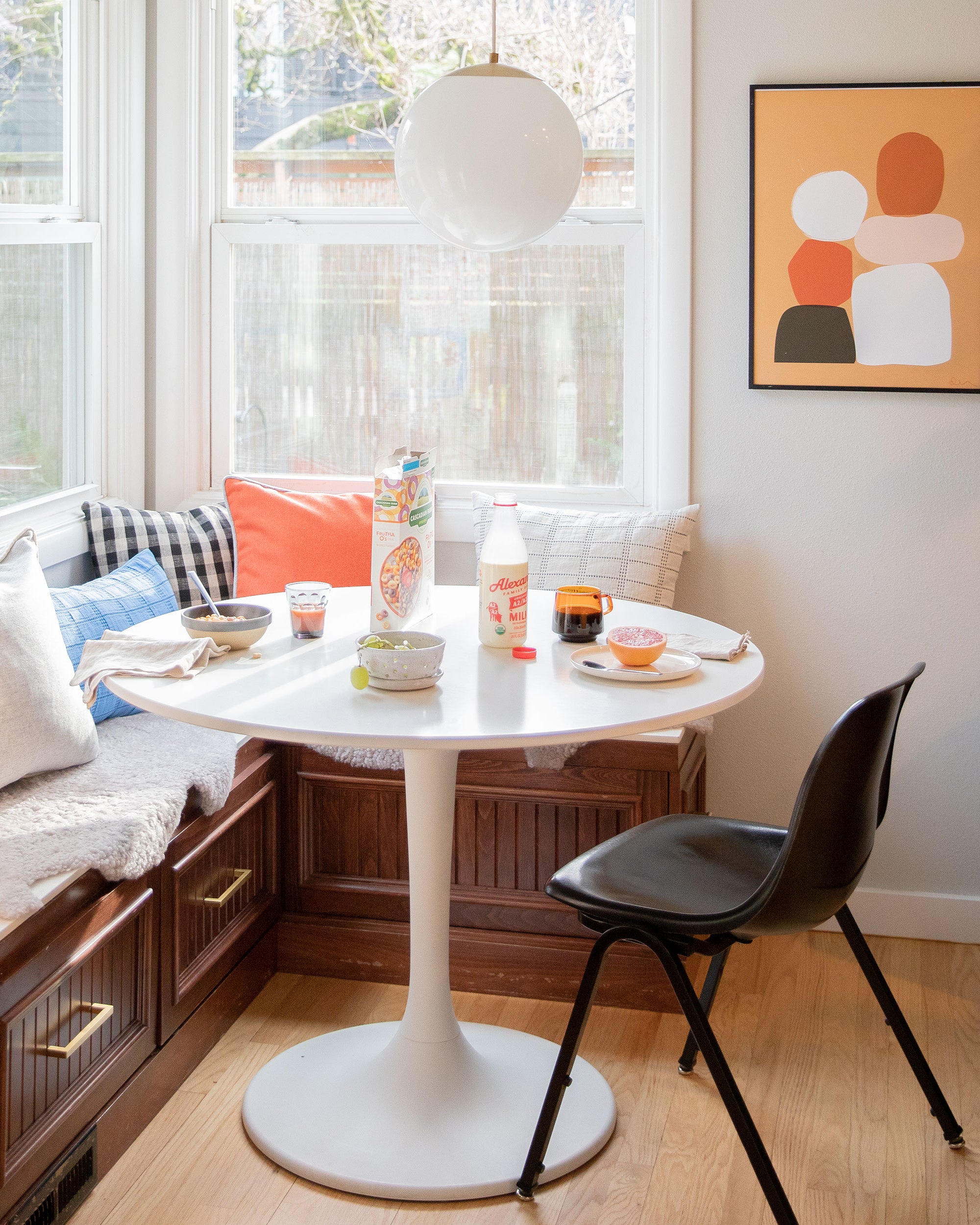 table with a chair and a window