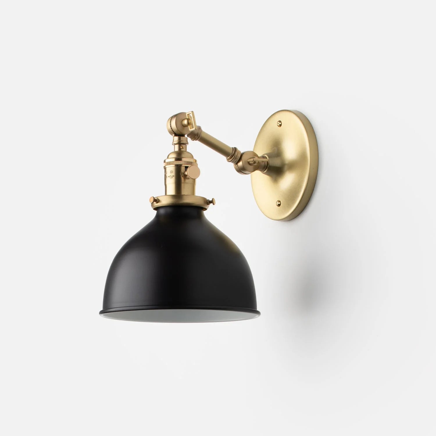 The Princeton Mid Sconce in Natural Brass.